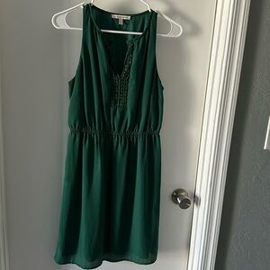 Sleeveless, knee length green dress